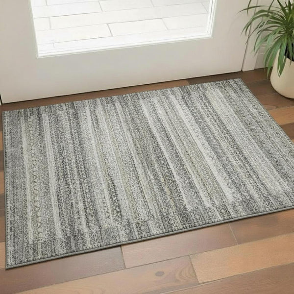 HomeRoots 5' X 8' Stylish Washable Area Rug in Pewter & Charcoal with UV Protection for High-Traffic Spaces 717841