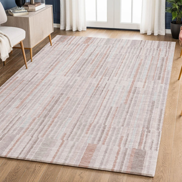 HomeRoots 10' X 14' Coral and Beige Striped Machine Washable Area Rug with UV Protection for Kids & Pets 717875