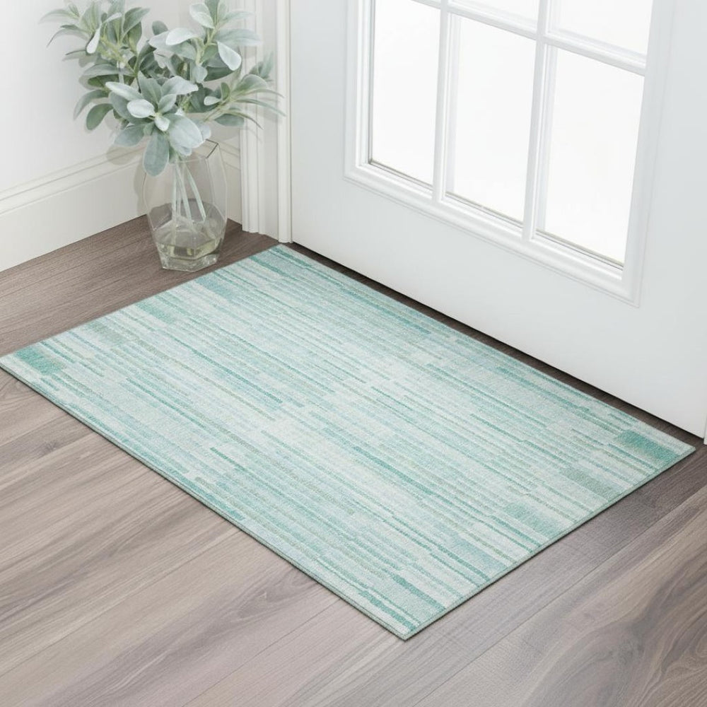 HomeRoots 5' Turquoise and Sky Blue Striped Area Rug - Washable, UV Protected, Durable for Busy Homes & Patios 717907