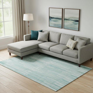 HomeRoots 10' X 14' Striped Turquoise & Sky Blue Washable Area Rug with UV Protection for Easy Care & Style 717911