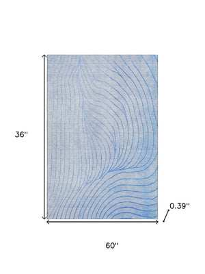 HomeRoots 5' X 8' Blue and Silver Abstract Area Rug – Stylish, Washable, UV-Protected, Perfect for Any Room! 718093