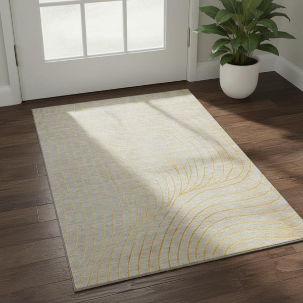 HomeRoots 5' X 8' Stylish Gold and Silver Abstract Area Rug - Machine Washable, UV Protection, Stain Resistant! 718105