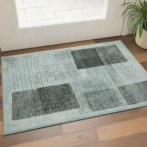 HomeRoots 5' X 8' Teal and Gray Geometric Area Rug – Stylish, Washable & UV-Protected for Kid-Friendly Spaces 718324