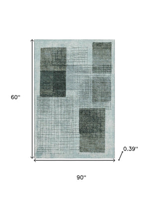 HomeRoots 8' Teal and Gray Geometric Washable Round Rug - UV Protected, Durable, and Stylish for Any Space 718325