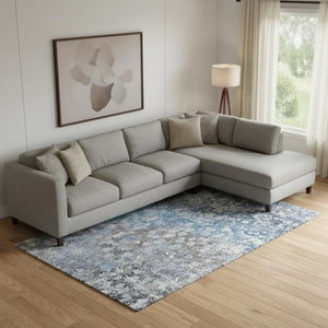 HomeRoots 9' X 12' Blue And Gray Abstract Area Rug – Washable, UV-Protected, Stain-Resistant Comfort for Homes 718333