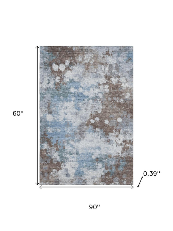HomeRoots 8' Brown & Blue Abstract Round Rug – Washable, UV-Protected, Durable Design for Busy Homes 718349