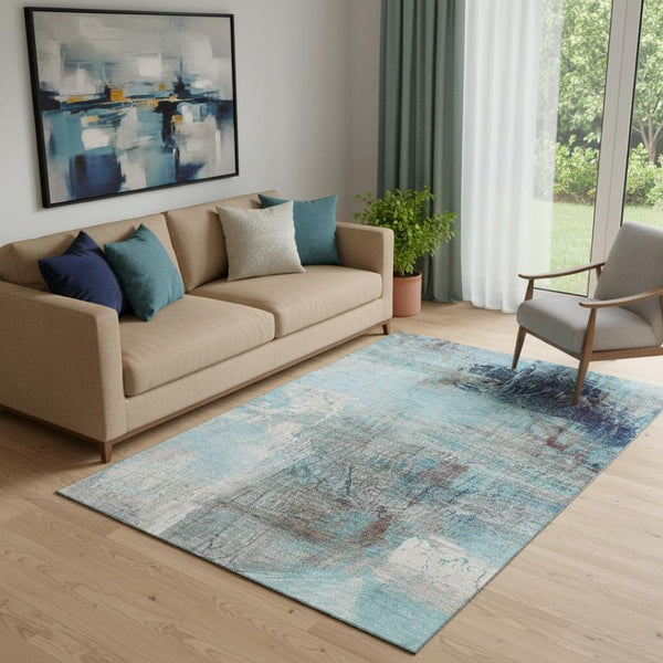 HomeRoots 8' Teal and Ivory Abstract Washable Round Rug – Stain Resistant, UV Protected for Family Spaces 718421