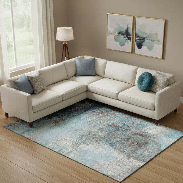 HomeRoots 9' X 12' Teal And Ivory Abstract Area Rug - Machine Washable, UV Protected, Perfect for Kids & Pets! 718423