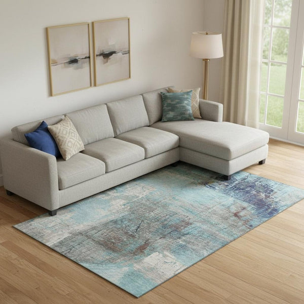 HomeRoots 10' Teal and Ivory Abstract Area Rug – Washable, UV Protected, Durable Design for Busy Homes 718424