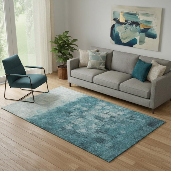 HomeRoots 8' Teal and Ivory Abstract Round Rug - Washable, UV Protected, Stain Resistant for Busy Homes 718481
