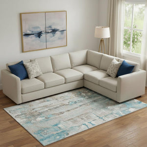 HomeRoots 10' X 14' Teal And Ivory Abstract Area Rug - Machine Washable, UV Protected, Perfect for Busy Homes 718532