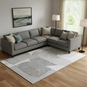 HomeRoots 9' X 12' Abstract Linen and Gray Washable Area Rug with UV Protection for Stylish, Durable Living Spaces 718550