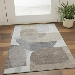 HomeRoots 5' X 8' Stylish Taupe and Gray Abstract Area Rug - Washable, UV Protected, Perfect for Busy Homes! 718577