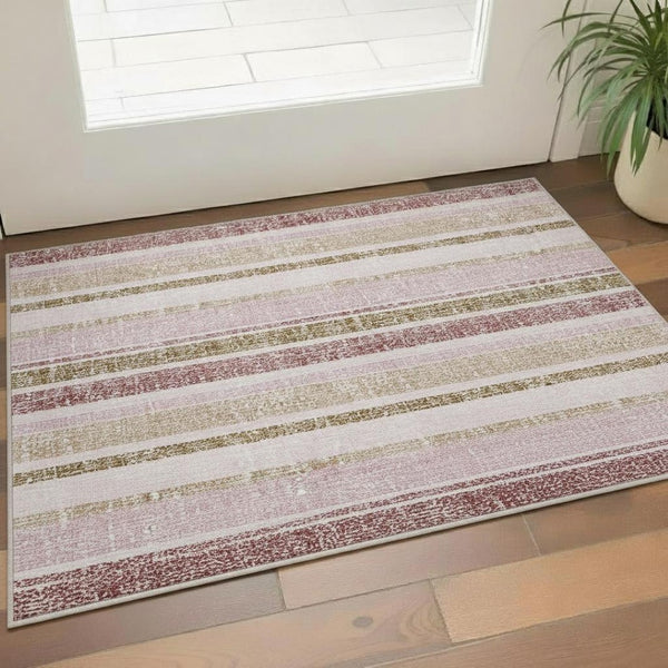 HomeRoots 5' X 8' Striped Pink and Beige Washable Area Rug with UV Protection for Stylish Home Decor 718619