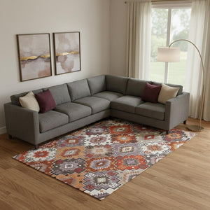 HomeRoots 9' X 12' Geometric Washable Area Rug in Rust & Lavender - Durable, UV Protected, & Pet Friendly! 718664