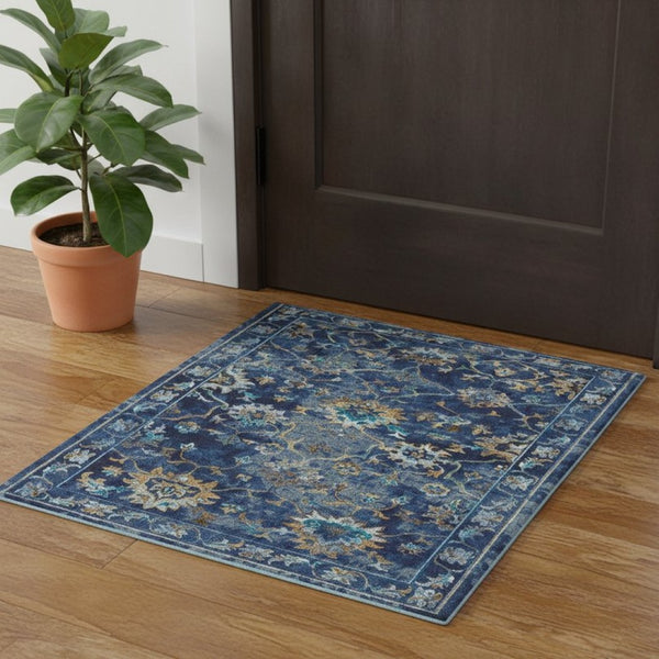 HomeRoots 8' Vibrant Bohemian Round Rug with Bold Red, Blue & Orange Diamond Pattern for Stylish Spaces 719076