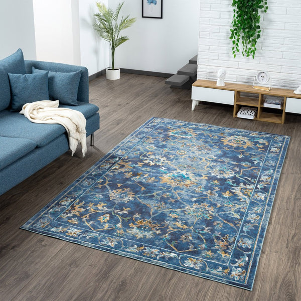 HomeRoots 8' Vibrant Bohemian Round Rug with Bold Red, Blue & Orange Diamond Pattern for Stylish Spaces 719076
