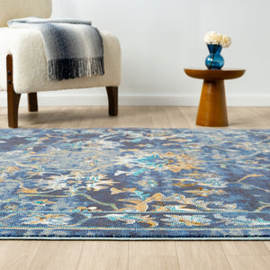 HomeRoots 8' Vibrant Bohemian Round Rug with Bold Red, Blue & Orange Diamond Pattern for Stylish Spaces 719076