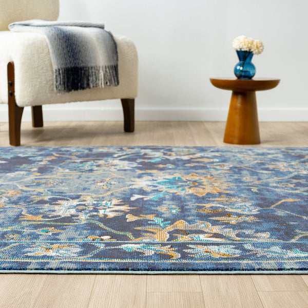 HomeRoots 8' Vibrant Bohemian Round Rug with Bold Red, Blue & Orange Diamond Pattern for Stylish Spaces 719076