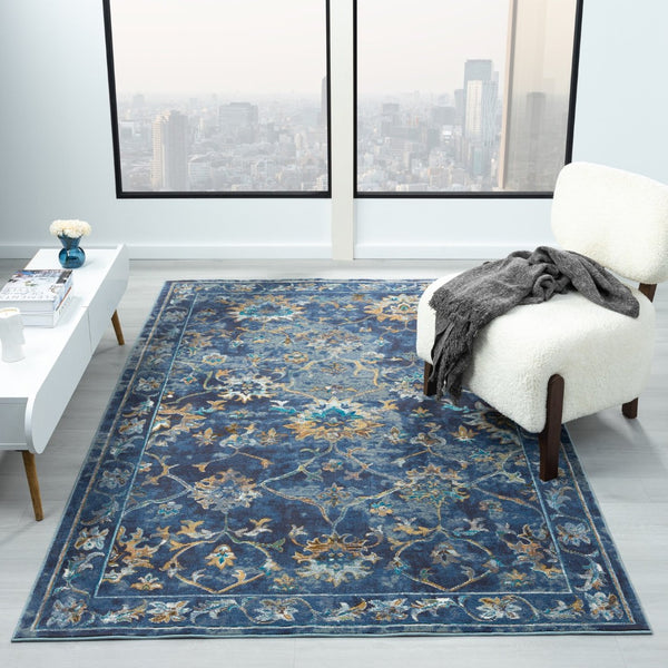 HomeRoots 8' Vibrant Bohemian Round Rug with Bold Red, Blue & Orange Diamond Pattern for Stylish Spaces 719076