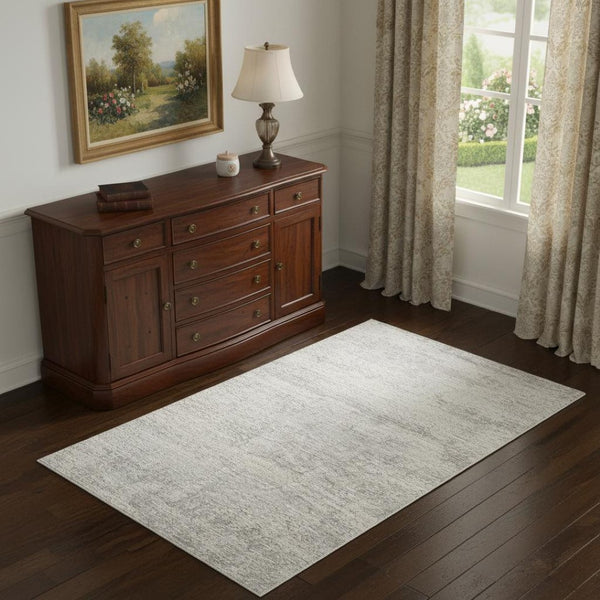 HomeRoots 4' Cream and Gold Abstract Area Rug - Contemporary Design for Luxurious Comfort and Durability 719114