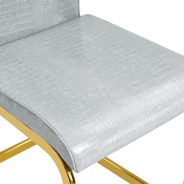 Set of Two Tufted Faux Leather Dining Chairs with Metal Legs for Glam Modern Rooms