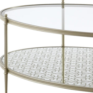 HomeRoots 54" Clear Glass and Champagne Steel Coffee Table with Storage Shelf - Modern Elegance for Any Space 719244
