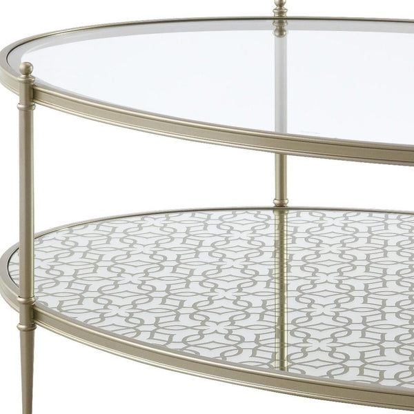 HomeRoots 54" Clear Glass and Champagne Steel Coffee Table with Storage Shelf - Modern Elegance for Any Space 719244
