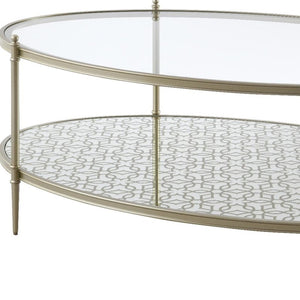 HomeRoots 54" Clear Glass and Champagne Steel Coffee Table with Storage Shelf - Modern Elegance for Any Space 719244