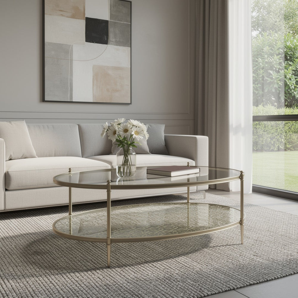 HomeRoots 54" Clear Glass and Champagne Steel Coffee Table with Storage Shelf - Modern Elegance for Any Space 719244