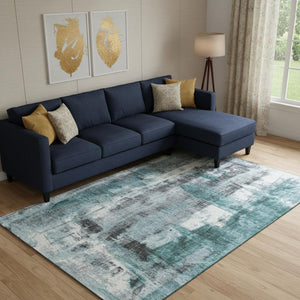 HomeRoots 10' X 14' Teal Charcoal Ivory Abstract Rug - Stylish, Washable, UV Resistant for Modern Homes 719292