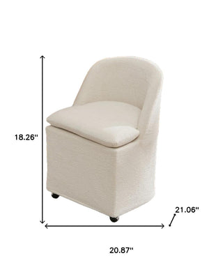 HomeRoots Set of Two Stylish Blue Chenille Wing Back Dining Chairs with Rolling Wheels for Versatile Use 719647