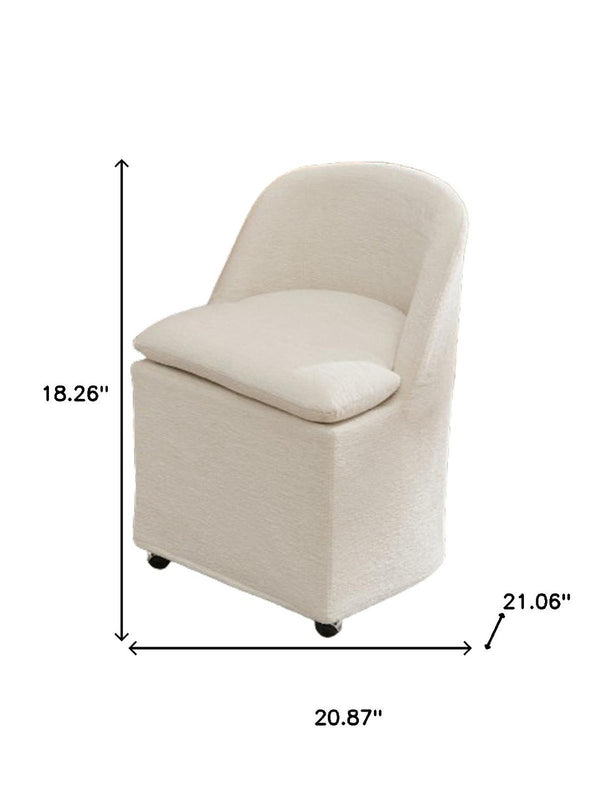 HomeRoots Set of Two Stylish Blue Chenille Wing Back Dining Chairs with Rolling Wheels for Versatile Use 719647