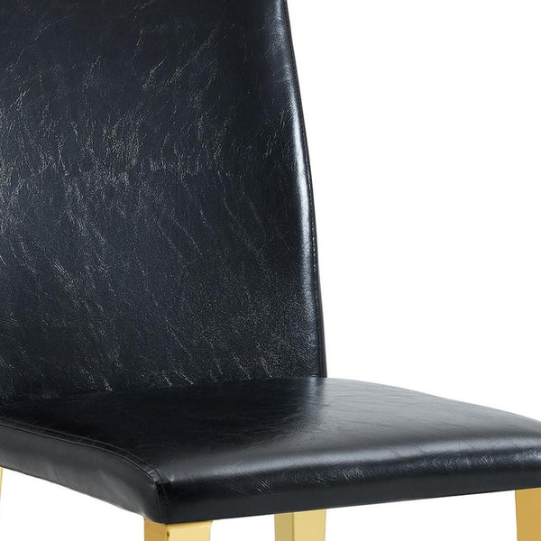 HomeRoots Set of Four Elegant Black and Silver Faux Leather Dining Chairs for Modern Home & Office Décor 719655