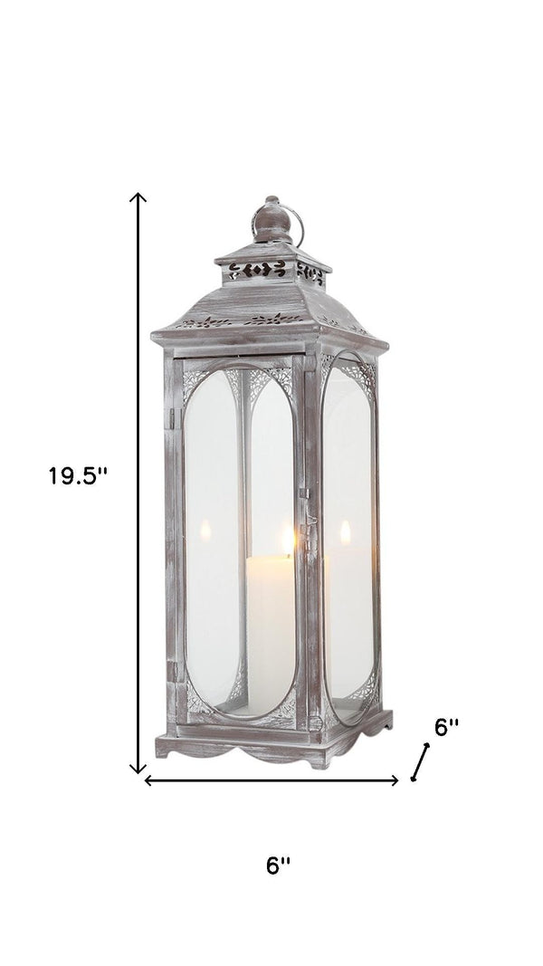 HomeRoots Set of Three Rustic Glass and Stainless Steel Lantern Candle Holders for Cozy Ambiance and Style 719764