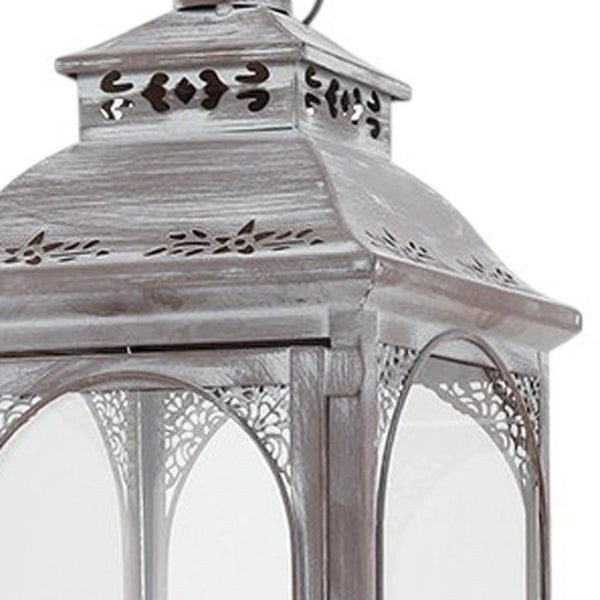 HomeRoots Set of Three Rustic Glass and Stainless Steel Lantern Candle Holders for Cozy Ambiance and Style 719764