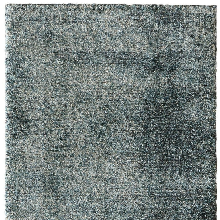 7 Blue Ivory Abstract Polypropylene High Pile Rug for Bohemian Coastal Living Spaces