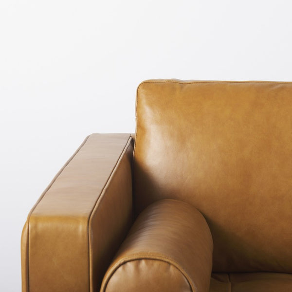 88 Inch Tan Leather Sofa with Accent Toss Pillows for Modern Living Rooms