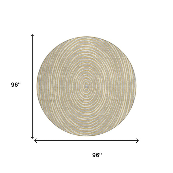 8 Foot Round Geometric Polyester Area Rug in Gold and Ivory for Indoor Outdoor Use
