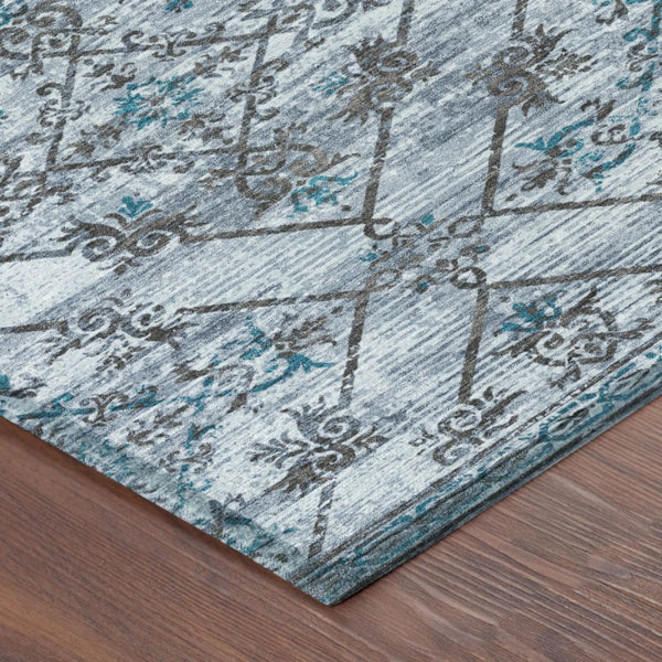 8 Ft Round Geometric Polyester Area Rug in Blue and Ivory for Indoor Outdoor Use