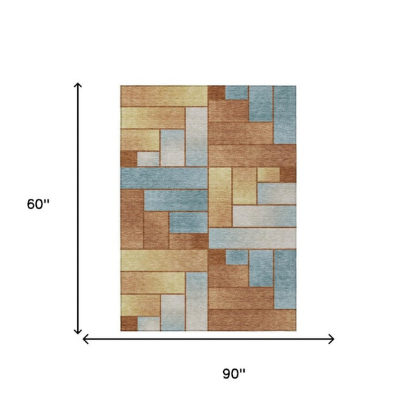 5' X 8' Orange and Blue Geometric Washable Indoor Outdoor Area Rug