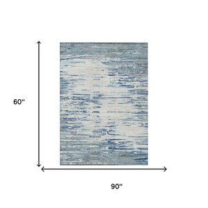 5 X 8 Abstract Blue Washable Polyester Area Rug for Indoor Outdoor Living Spaces