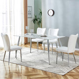 Hearth and Haven Table and Chair Set. 1 Table with 4 White Leatherette Chairs.Rectangular Dining Table with White Imitation Marble Tabletop and Silver Metal Legs.Paired with 4 Chairs with Silver Legs.Dt-1544 C-008 W1151S00912