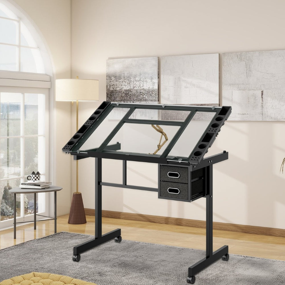 English Elm Adjustable Glass Top Drafting Table with Tilting Surface Fabric Storage and Locking Wheels Black W347P449398