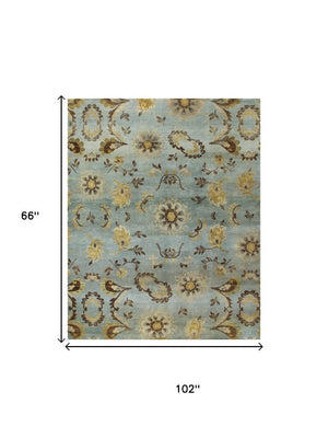 5 X 8 Hand Knotted Wool Floral Area Rug in Blue Brown Tan Artisan Woven