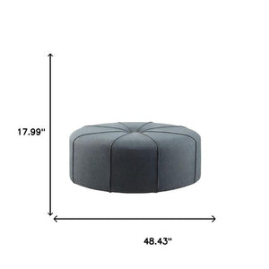 48 Inch Oval Tufted Cocktail Ottoman in Slate Blue Linen Cotton Blend Fabric