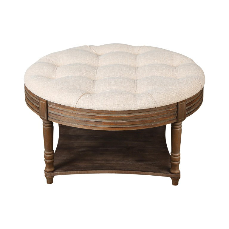 HomeRoots 31 Inch Round Coffee Table in Beige Fabric with Solid Wood Base for Living Room 769629