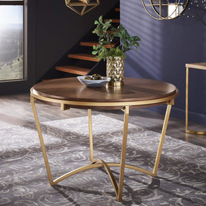 Round Dining Table with Gold Iron Base and Mdf Top for Modern Spaces