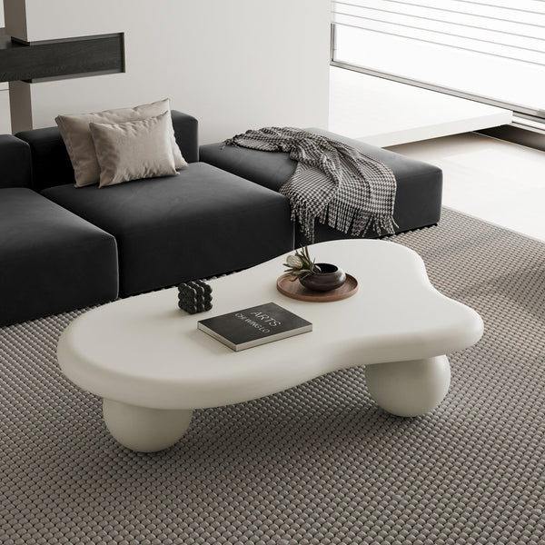 English Elm 47 Inch Cloud-Shaped Coffee Table With Elegant Cream Finish & 3 Ball Legs For Modern Living Spaces W1435S00014