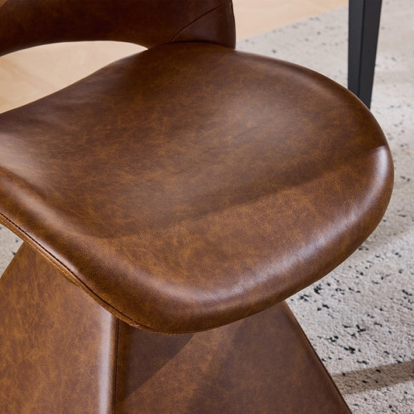 English Elm The Swivel Dining Chair with Hollow Cutout Back Faux Leather Hardwood Frame Modern Brown W3612P436512